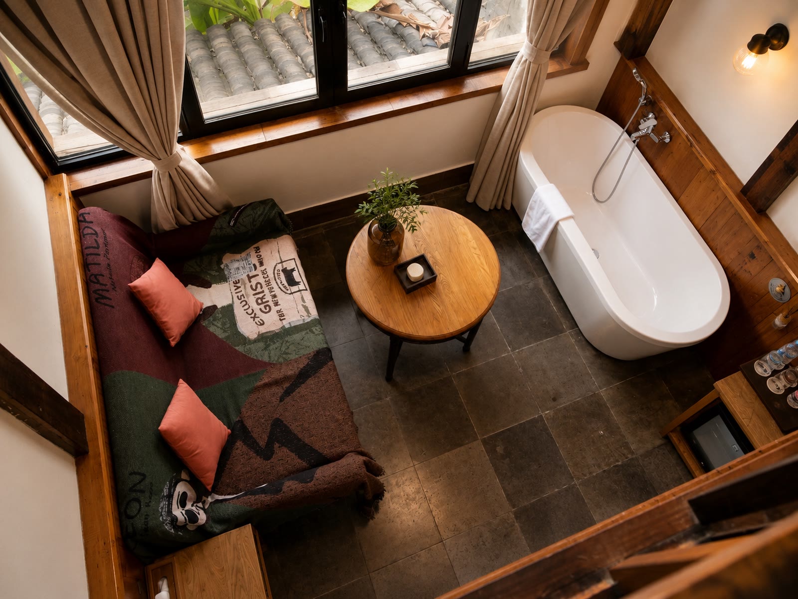 Family Loft Room: Sitting area and bathtub seen from above