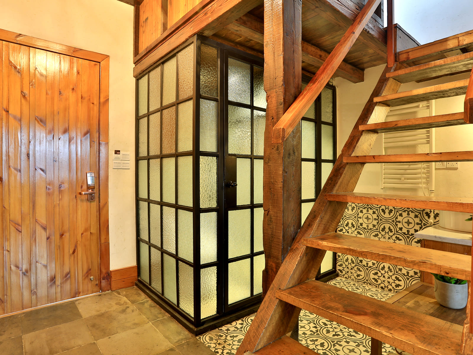 Family Loft Room: Wooden stairs connecting both levels
