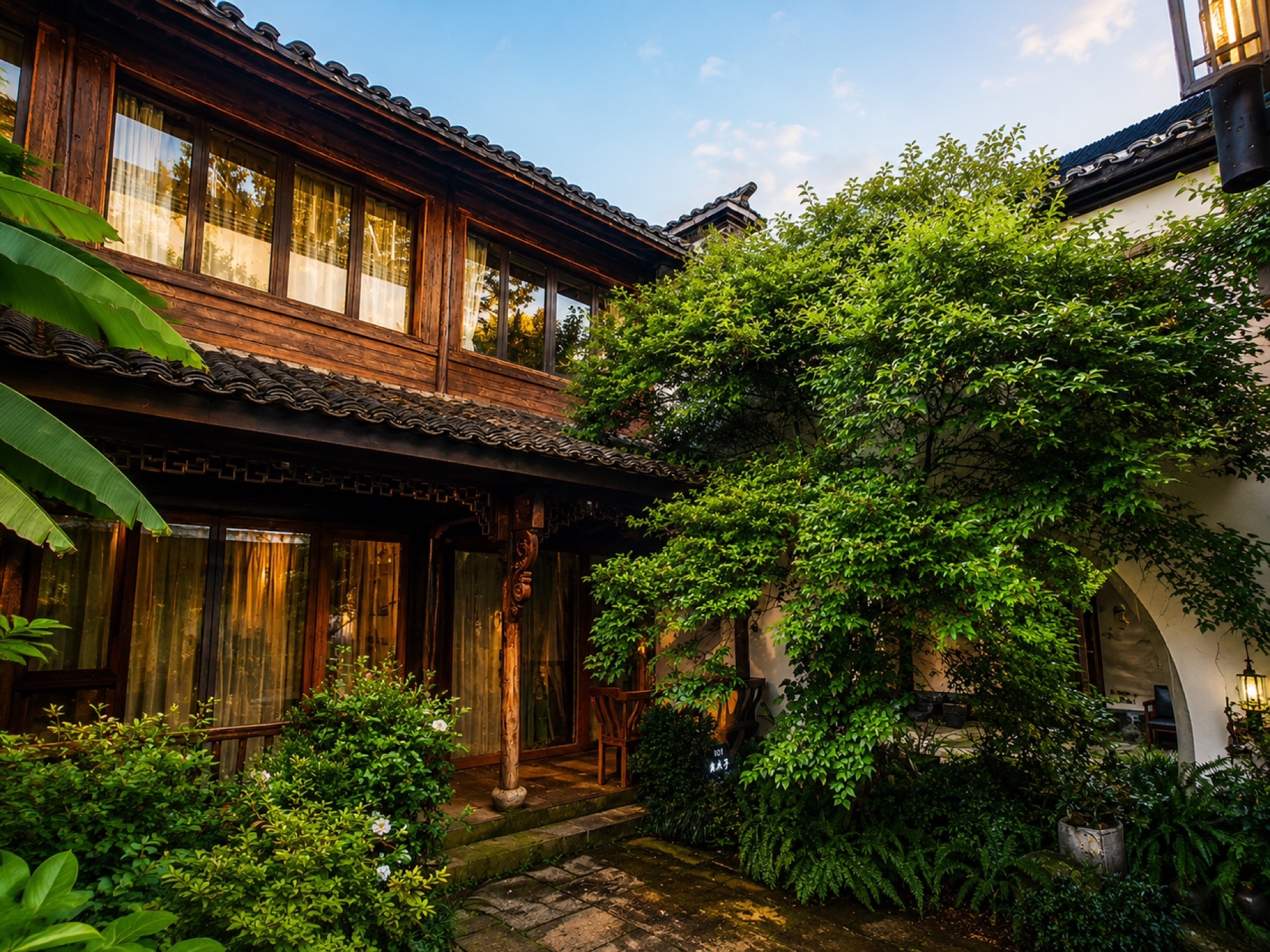 The leafy courtyard at The Moon and Sixpence Homestay
