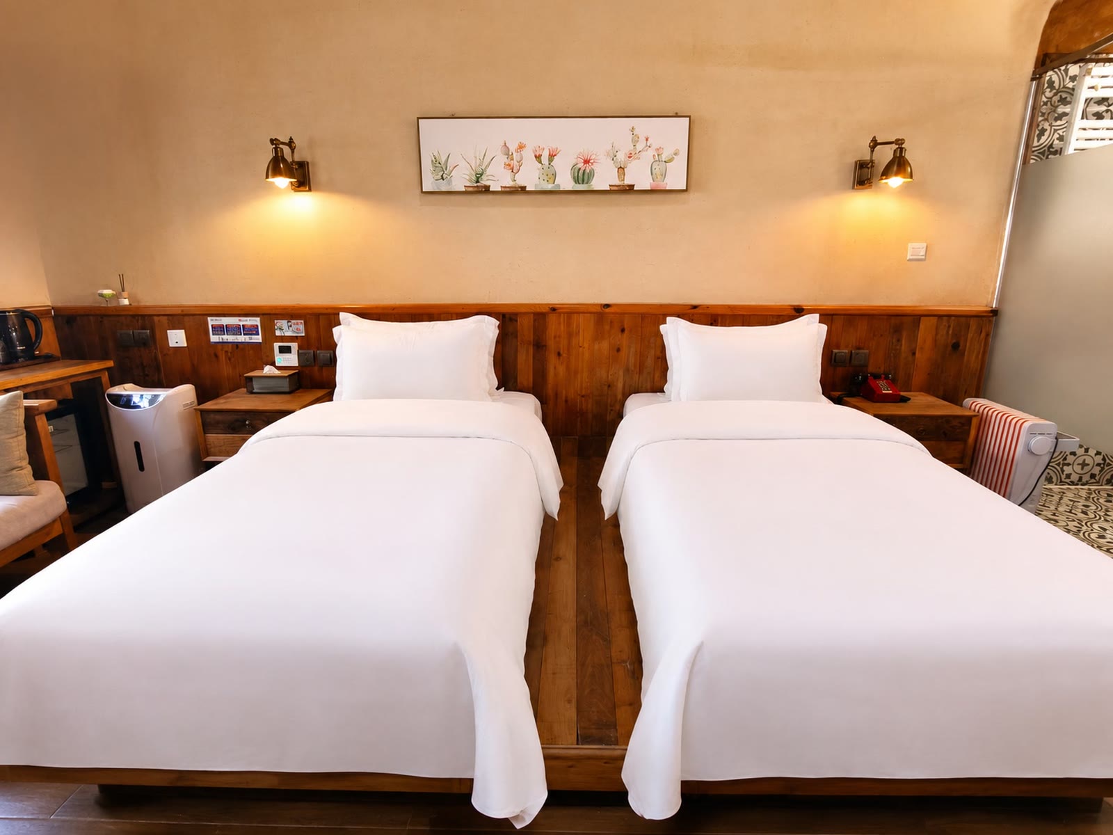 Skylight Courtyard Twin Room: Twin-bed headboards and daylight